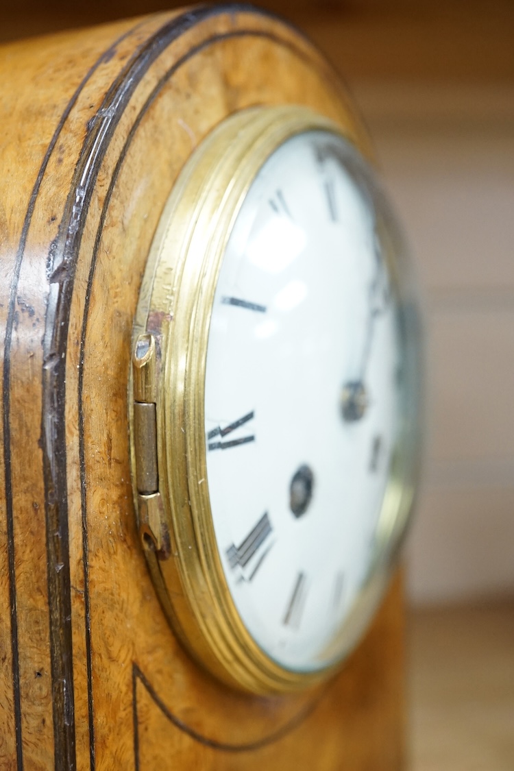 A French late 19th century domed topped burr walnut mantel clock, 23cm high